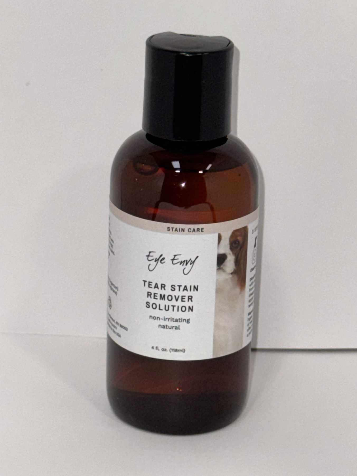 Eye Envy Tear Stain Remover used during dog grooming sessions.
