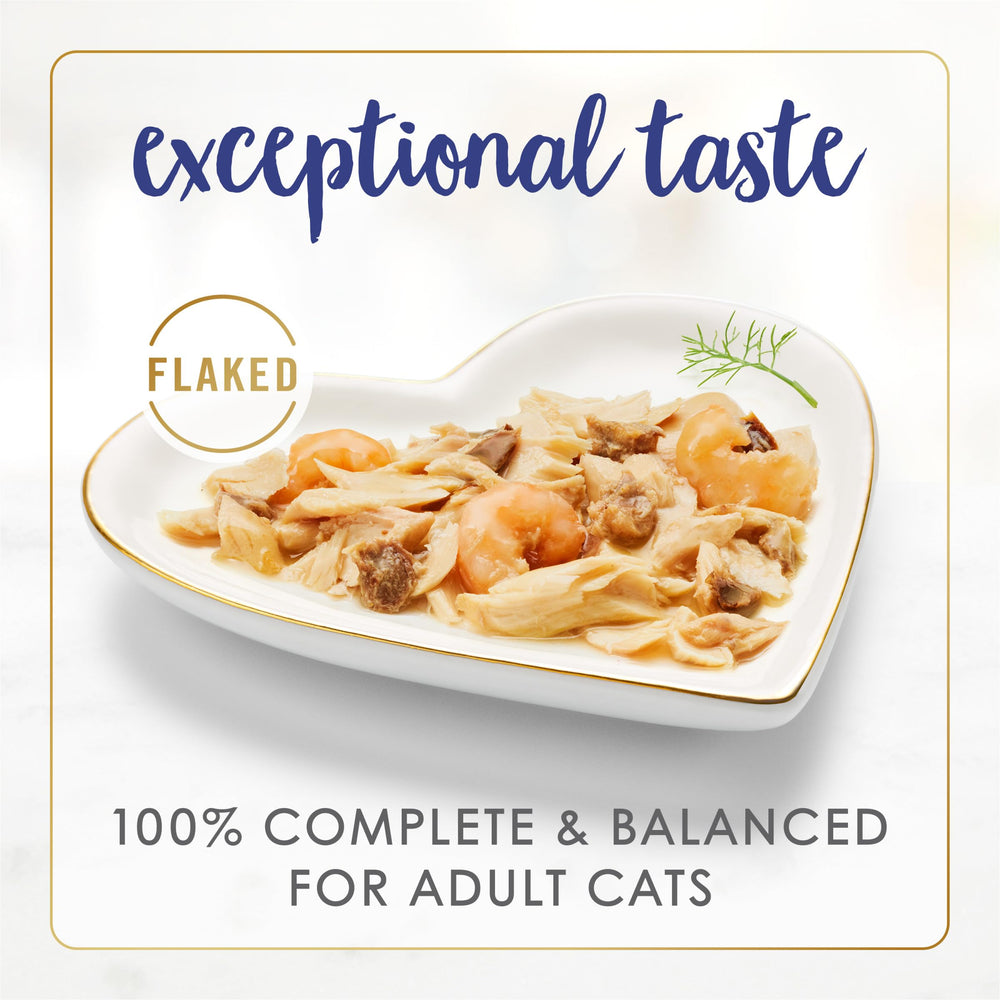 Fancy Feast Flaked Fish and Shrimp Feast serving plate with appetizing meal for adult cats