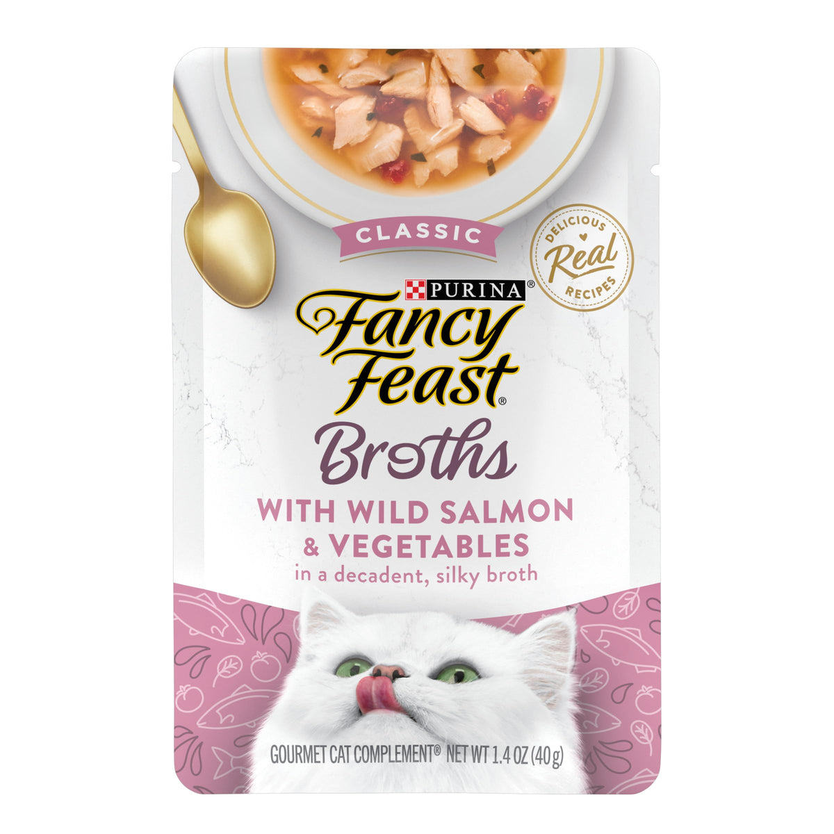 Fancy Feast lickable broth with wild salmon over kibble for added moisture.