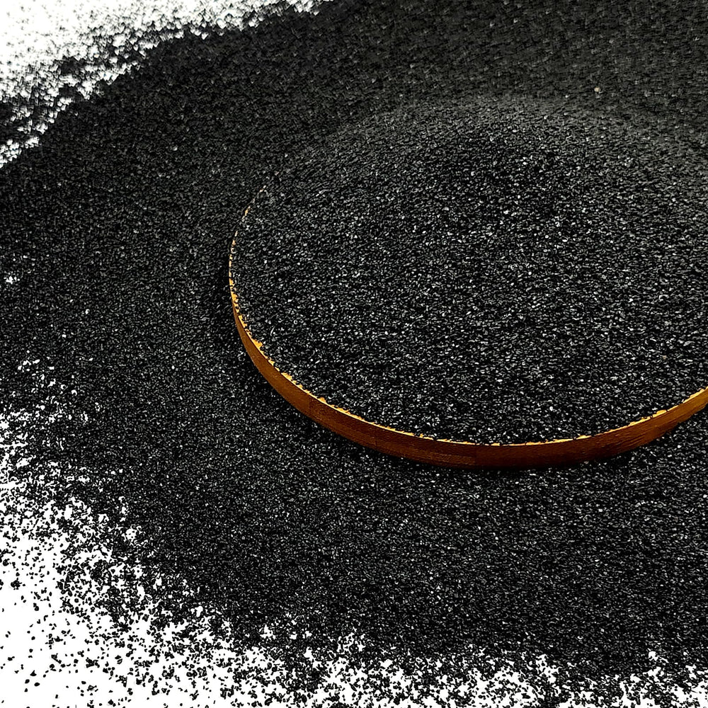 FANTIAN black aquarium sand in a clear tank enhances a sleek, natural look.