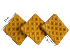 Farmland Traditions training treats mini-squares closeup for positive reinforcement with dogs.