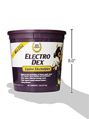 Farnam Electro Dex dosing spoon demonstrates easy 2 oz measurement for water or feed