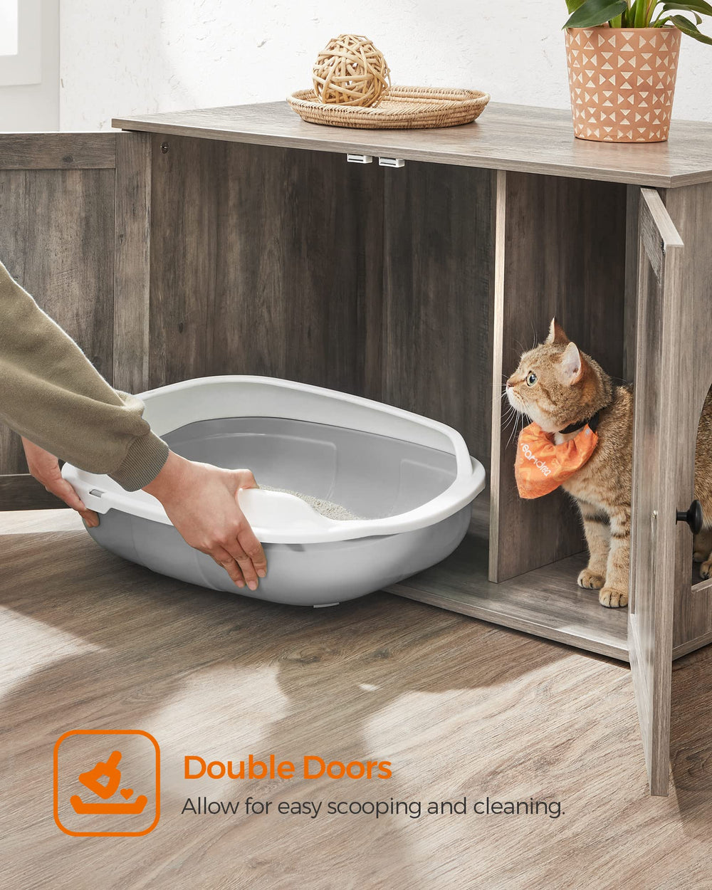 Plants and decor placed on Feandrea top surface to illustrate multi-use styling