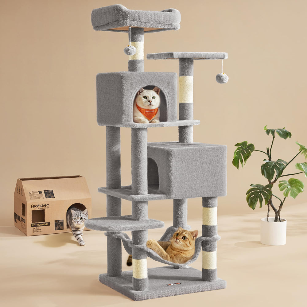 Feandrea cat tree top perch view for lounging and observation in a busy multi-cat home.
