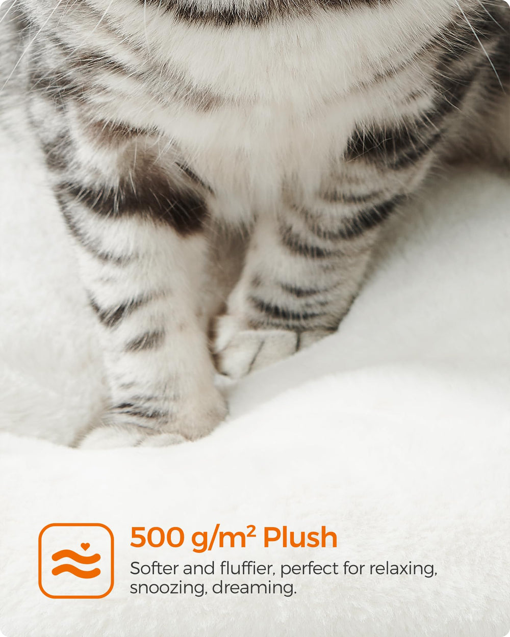 Feandrea cat tree scratching posts withstand claws during playful sessions.