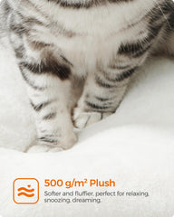 Feandrea cat tree scratching posts withstand claws during playful sessions.