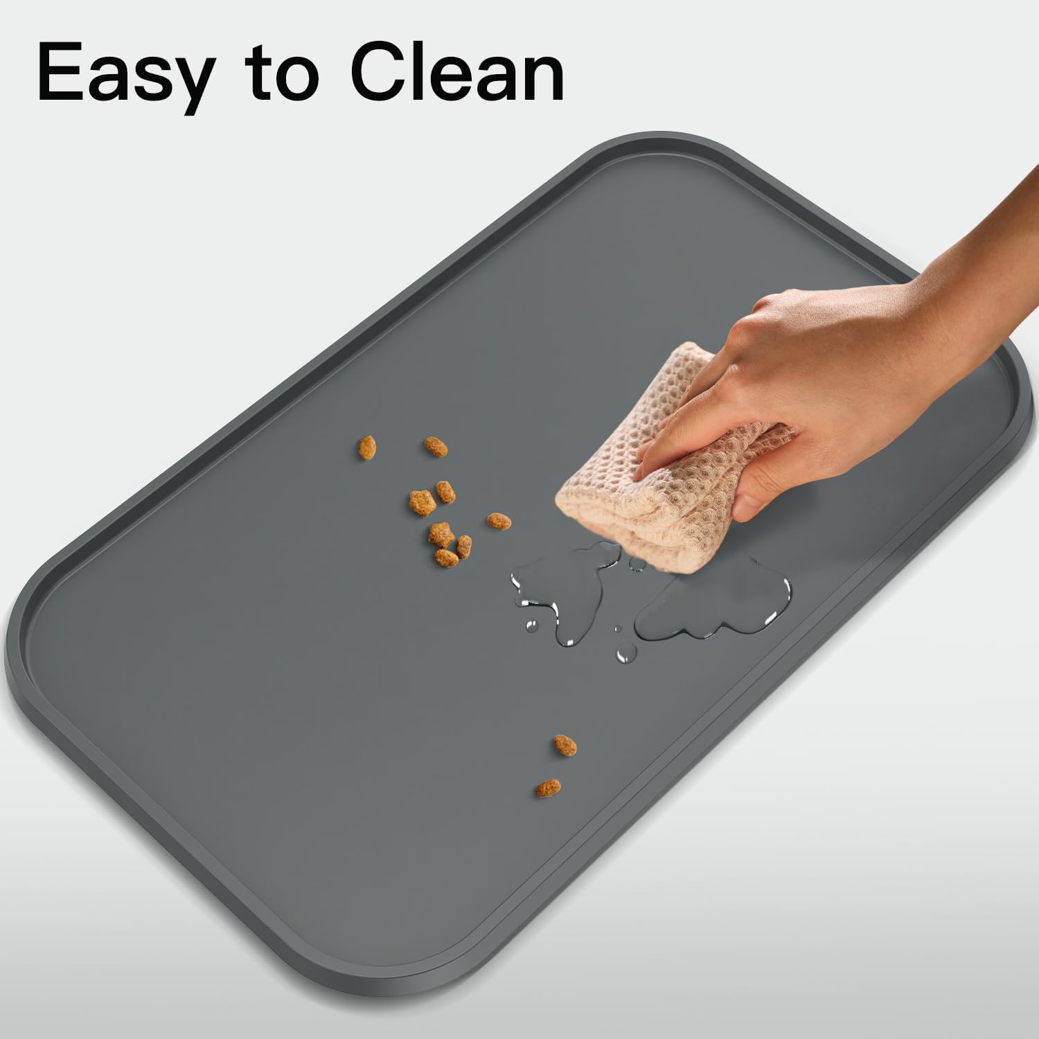 Feedoo mat under water bowls protects floor from drips.