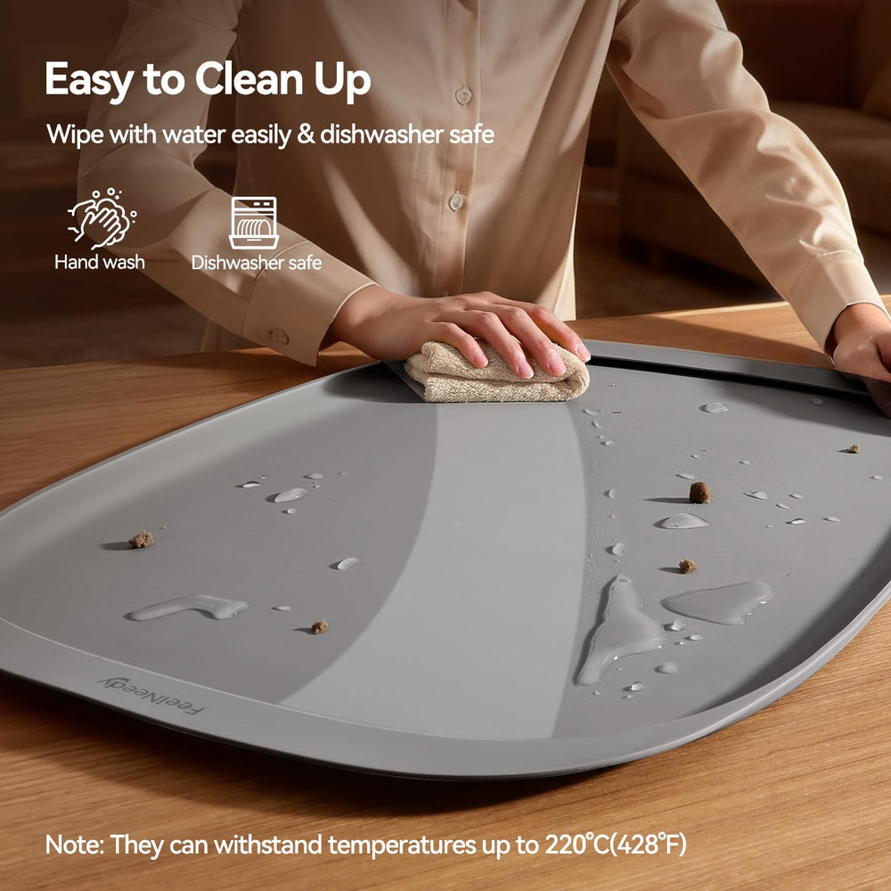 FEELNEEDY dishwasher-safe silicone mat for easy cleaning after feeding.