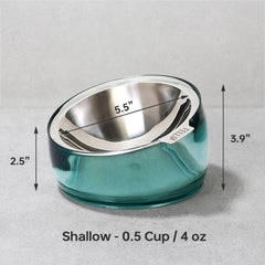 Felli Oblik wide oval dish reduces spills during cat feeding sessions.