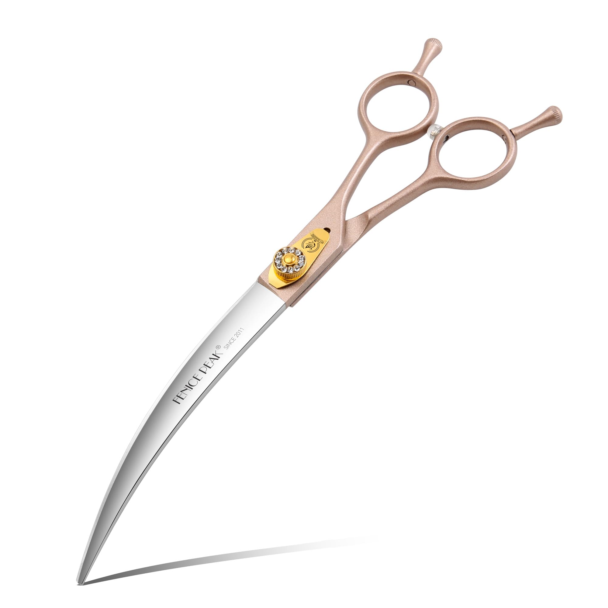 Fenice Peak 45° curved scissors showcase a rose-gold arc for smooth coat shaping.