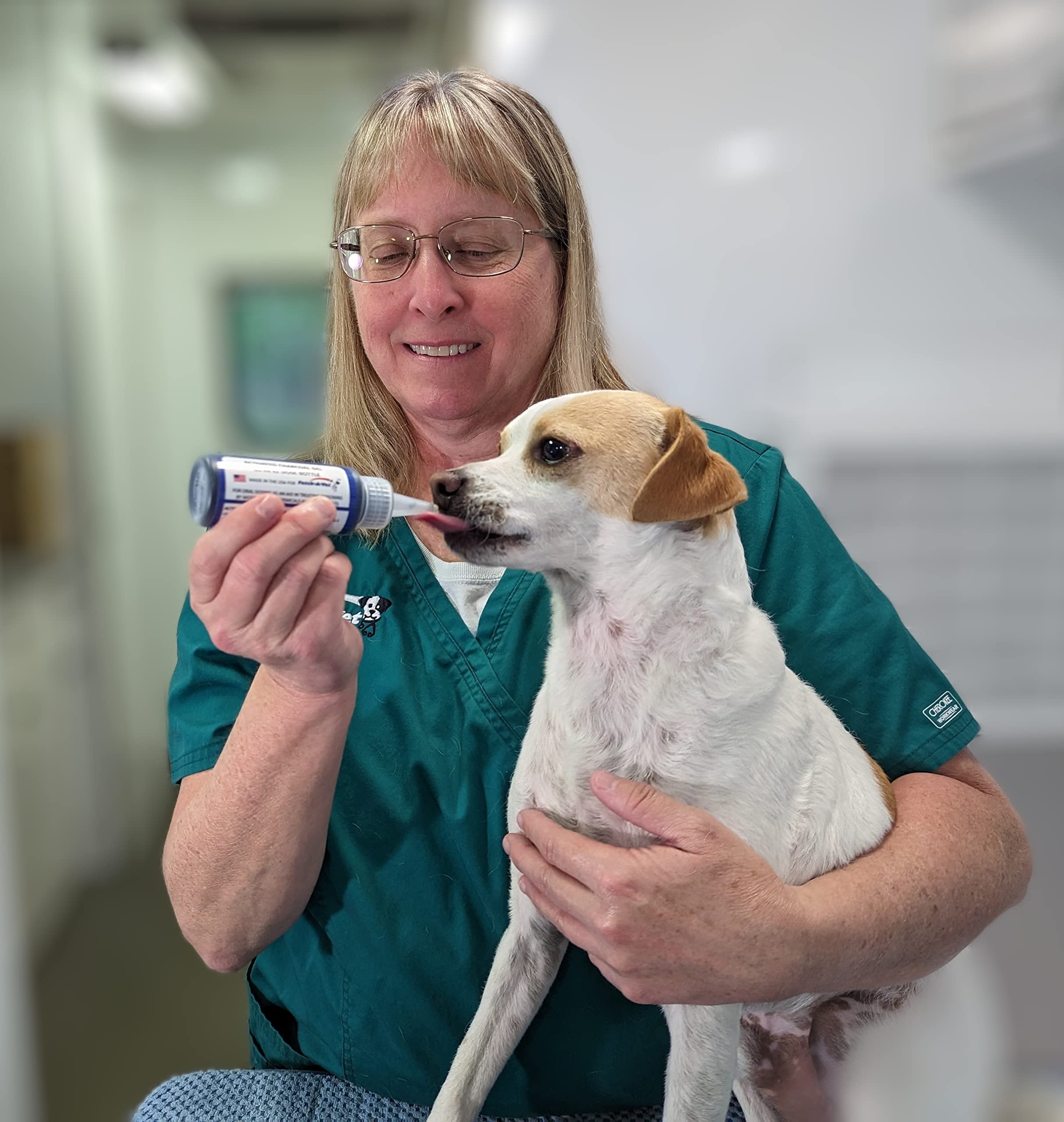 Fetch A Vet EZ Dose bottle cap enabling easy dosing during a pet emergency.