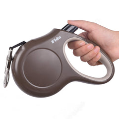Fida retractable leash 16ft nylon tape shown with sturdy grip for daily walks