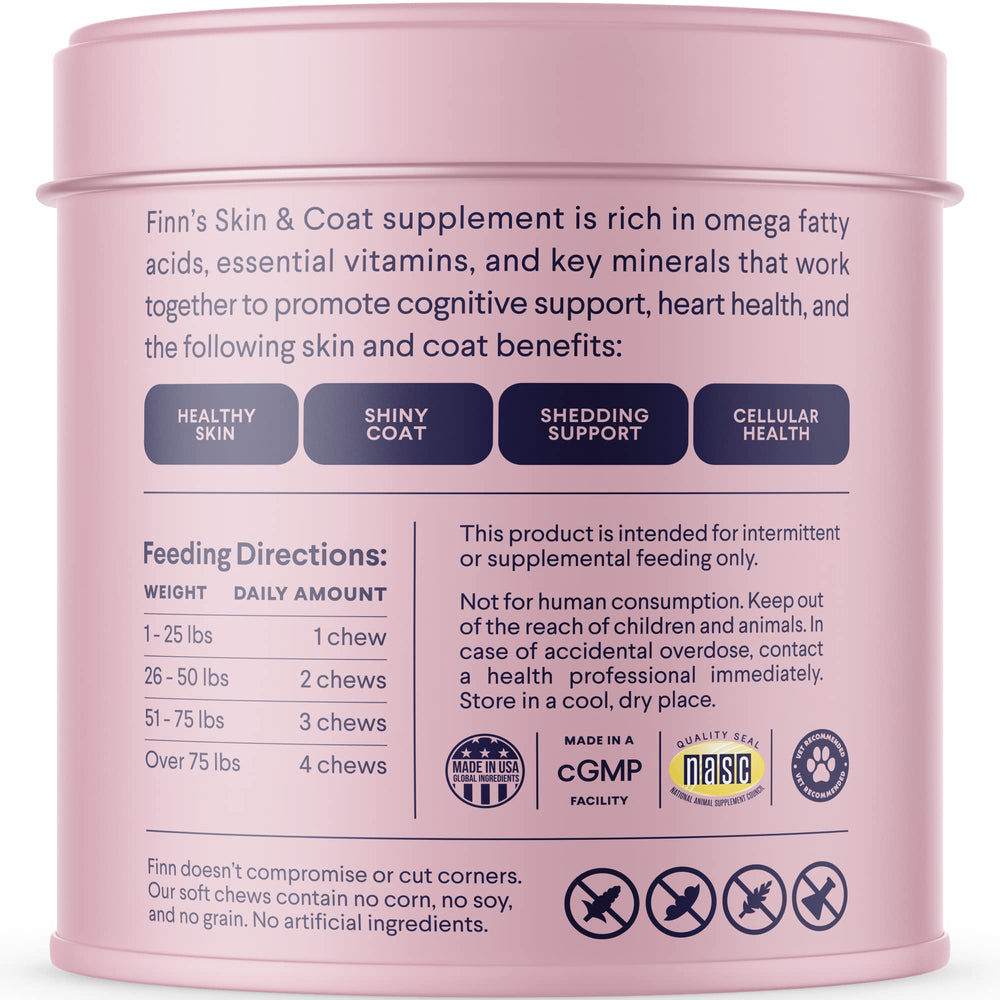 Finn Skin & Coat dog chewing a chew as daily supplement