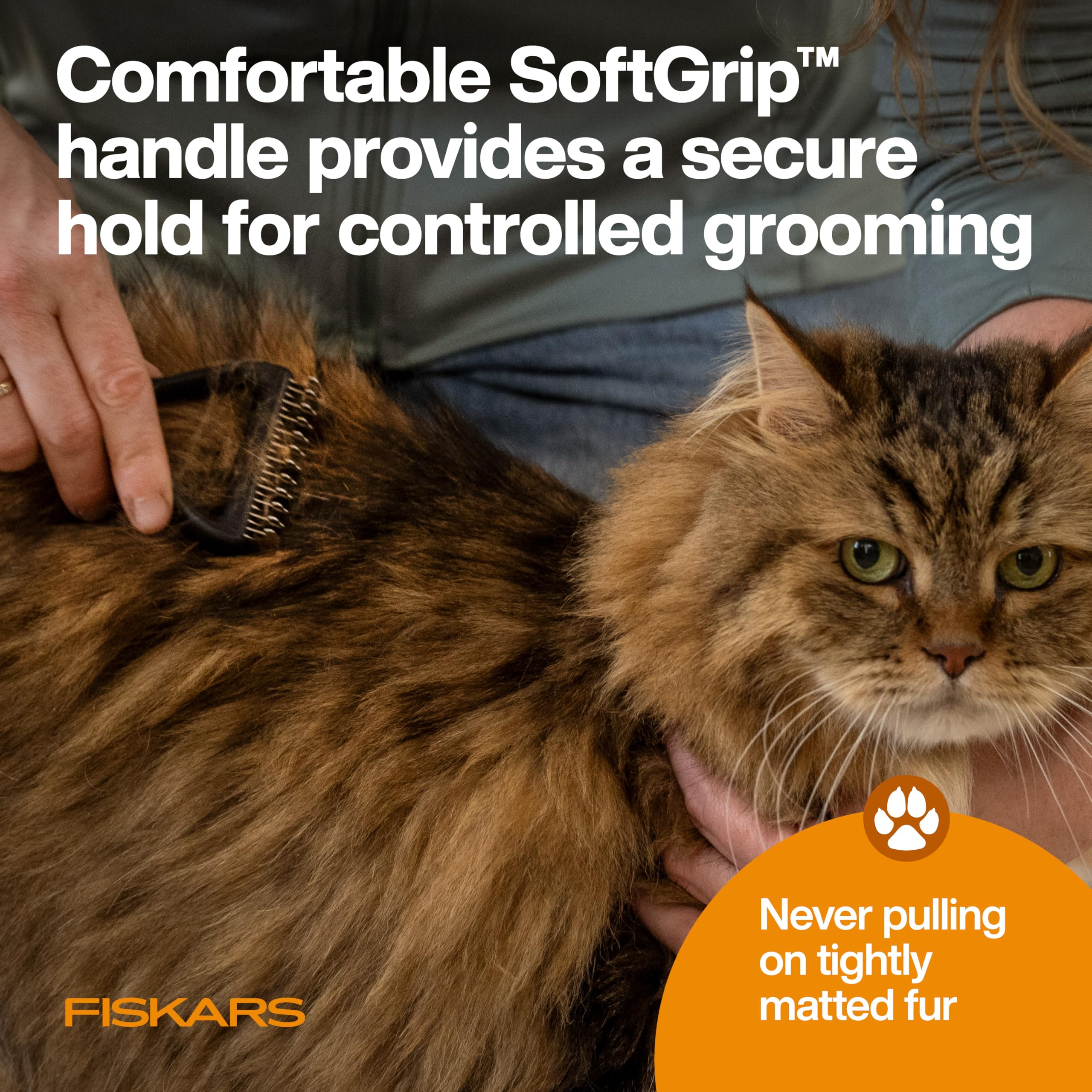 Fiskars rake in use with a light coat detangling session.