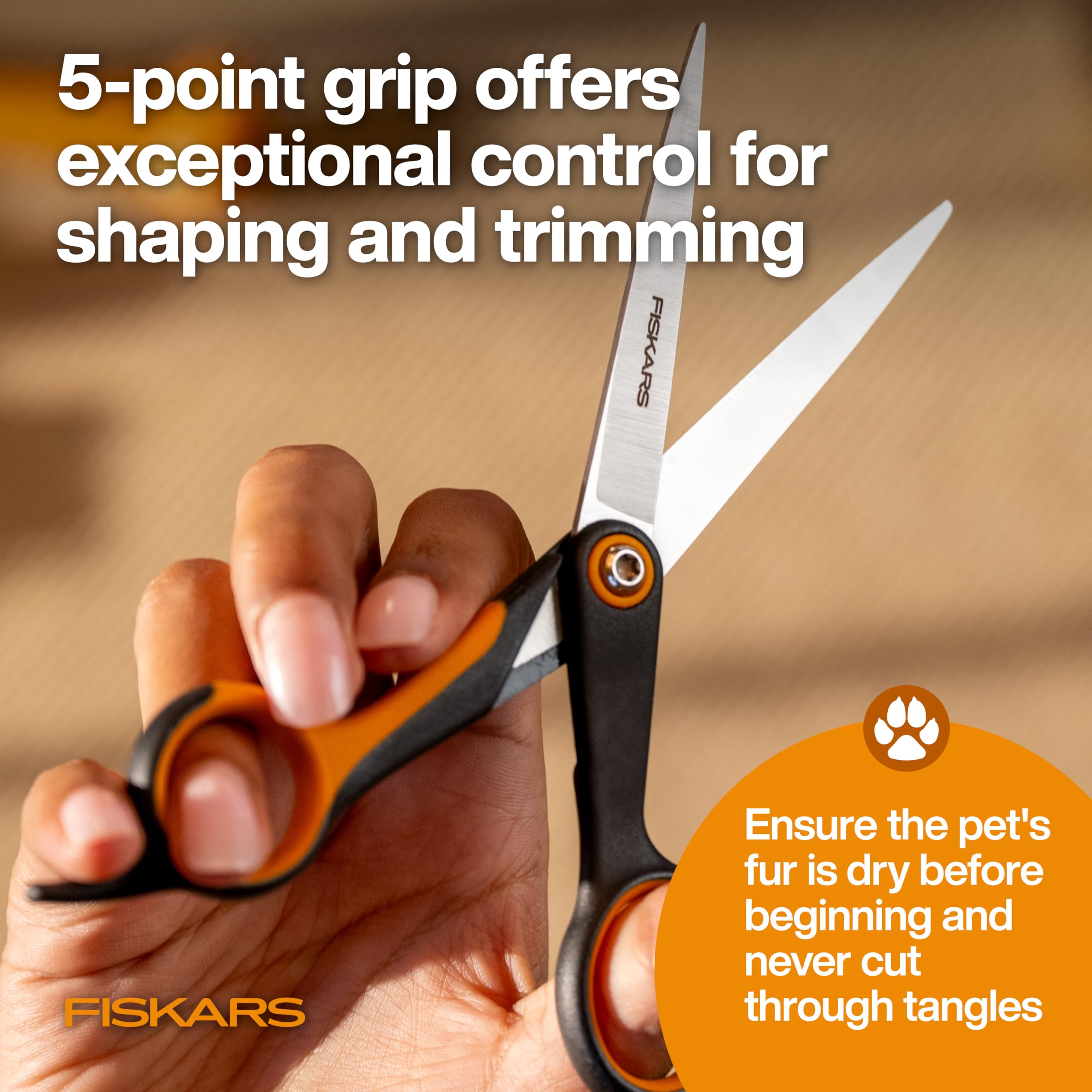Fiskars SoftGrip handle with 5-point grip enhances comfort during trimming.