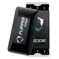 Flipper Edge 2-in-1 scrubber-scraper on glass tank.