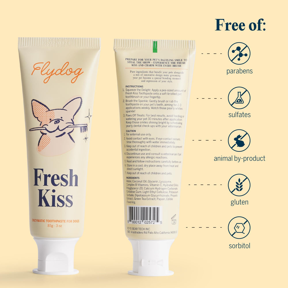 Dog enjoying brushing with FlyDog kit for fresher breath