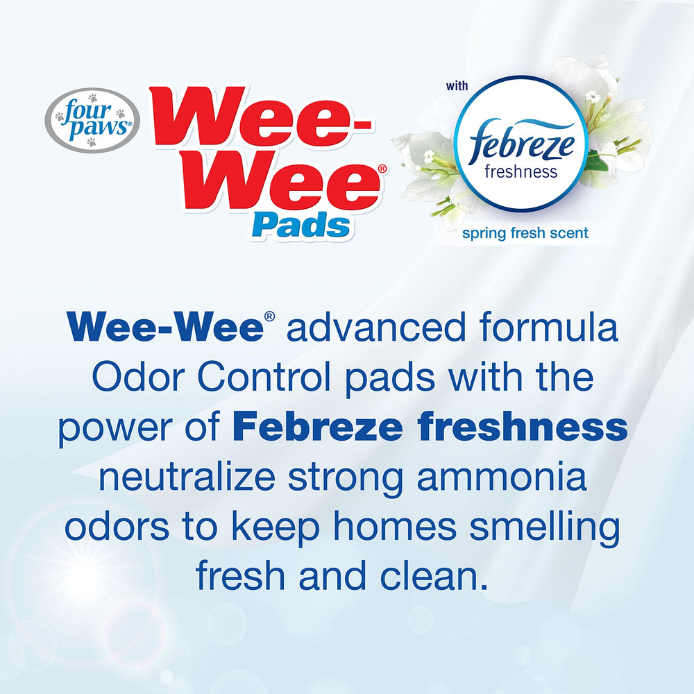 Four Paws Wee-Wee Odor Control pads open packaging for easy setup