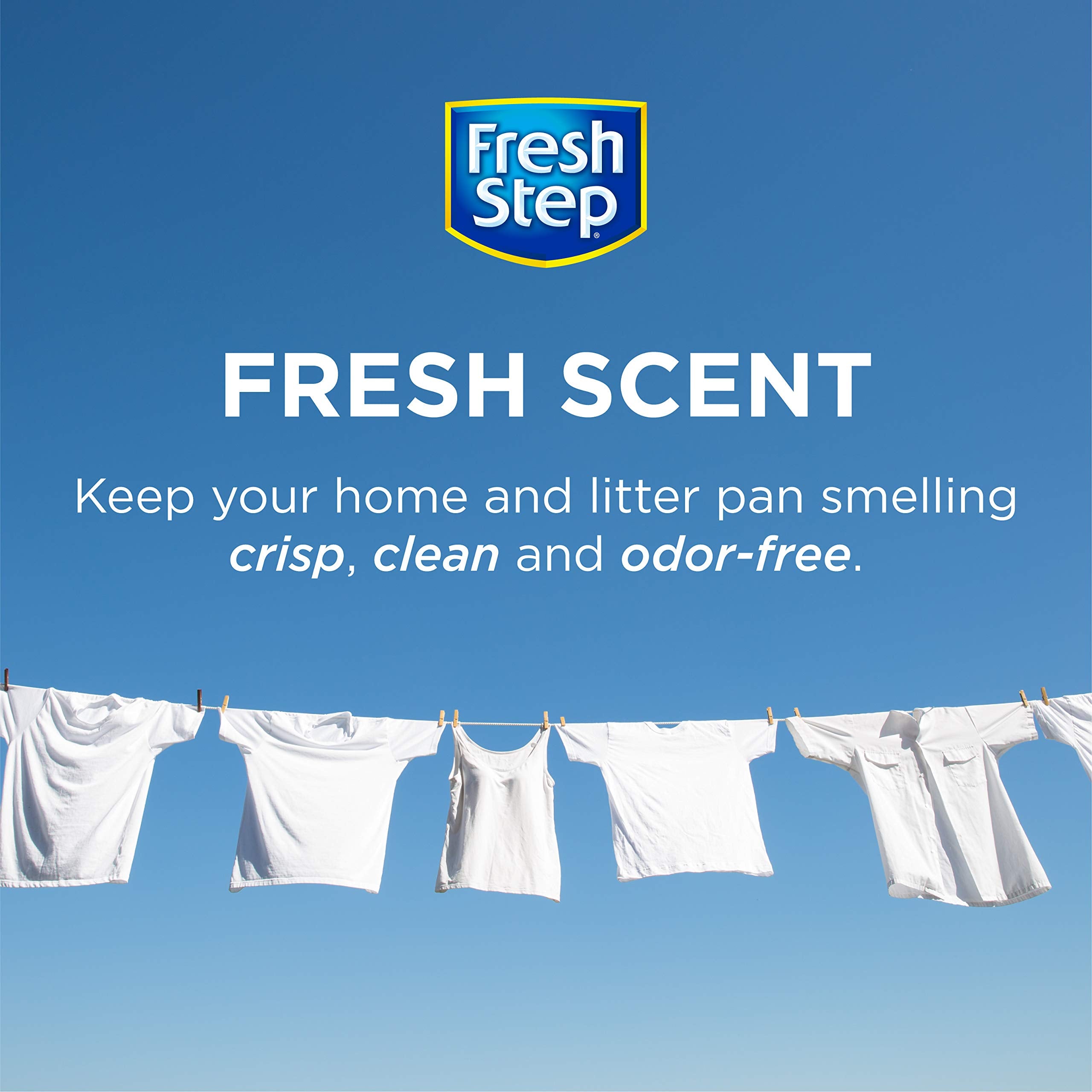 Fresh Step crystals sprinkled into a litter box for ongoing freshness.