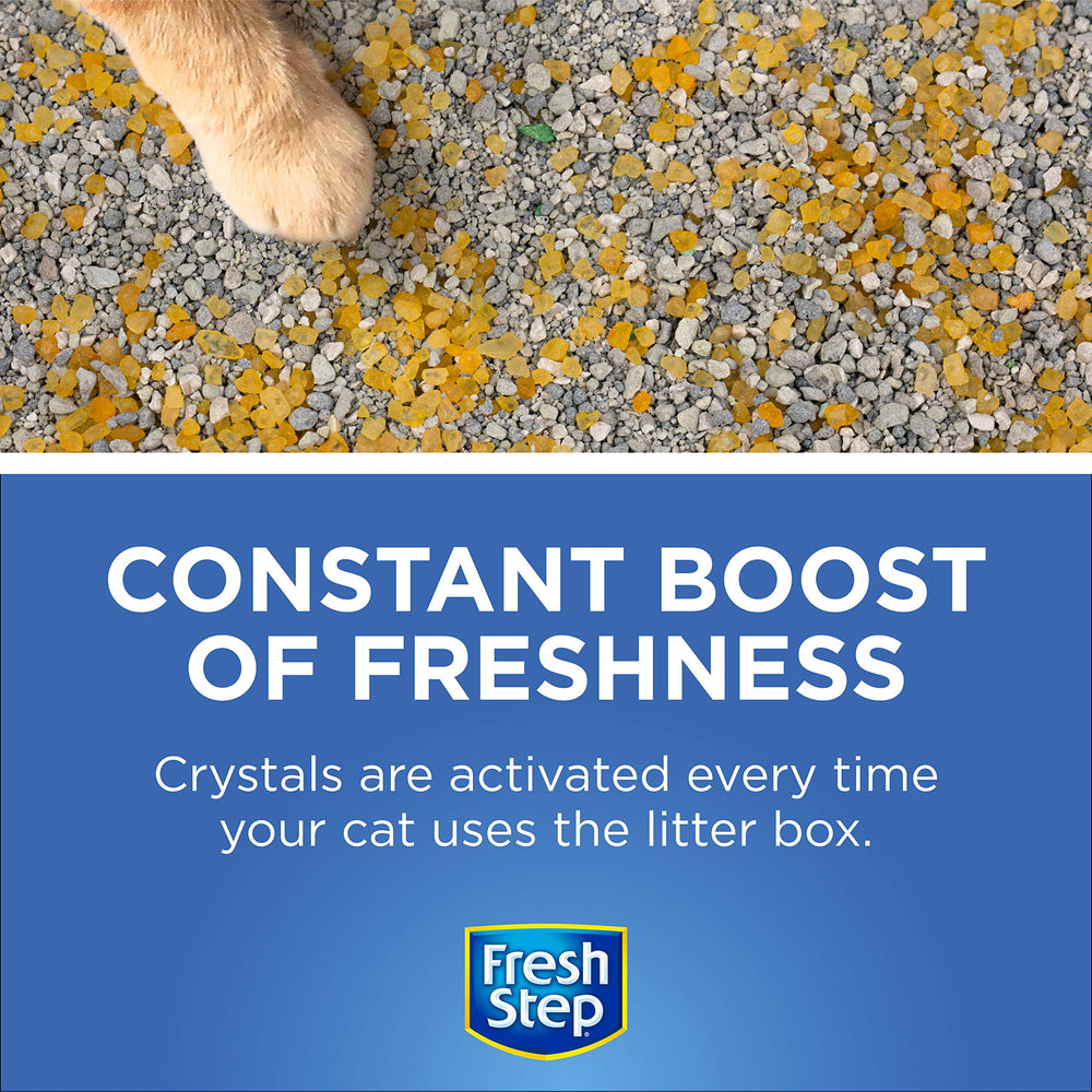 Easy-pour Fresh Step deodorizer used beside the litter box for quick refresh.
