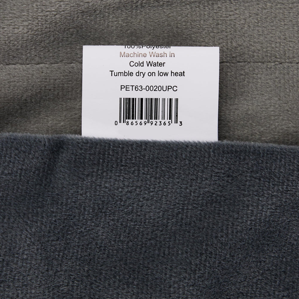 Friends Forever Bailey blanket draped over bed for warm pet comfort and protection.