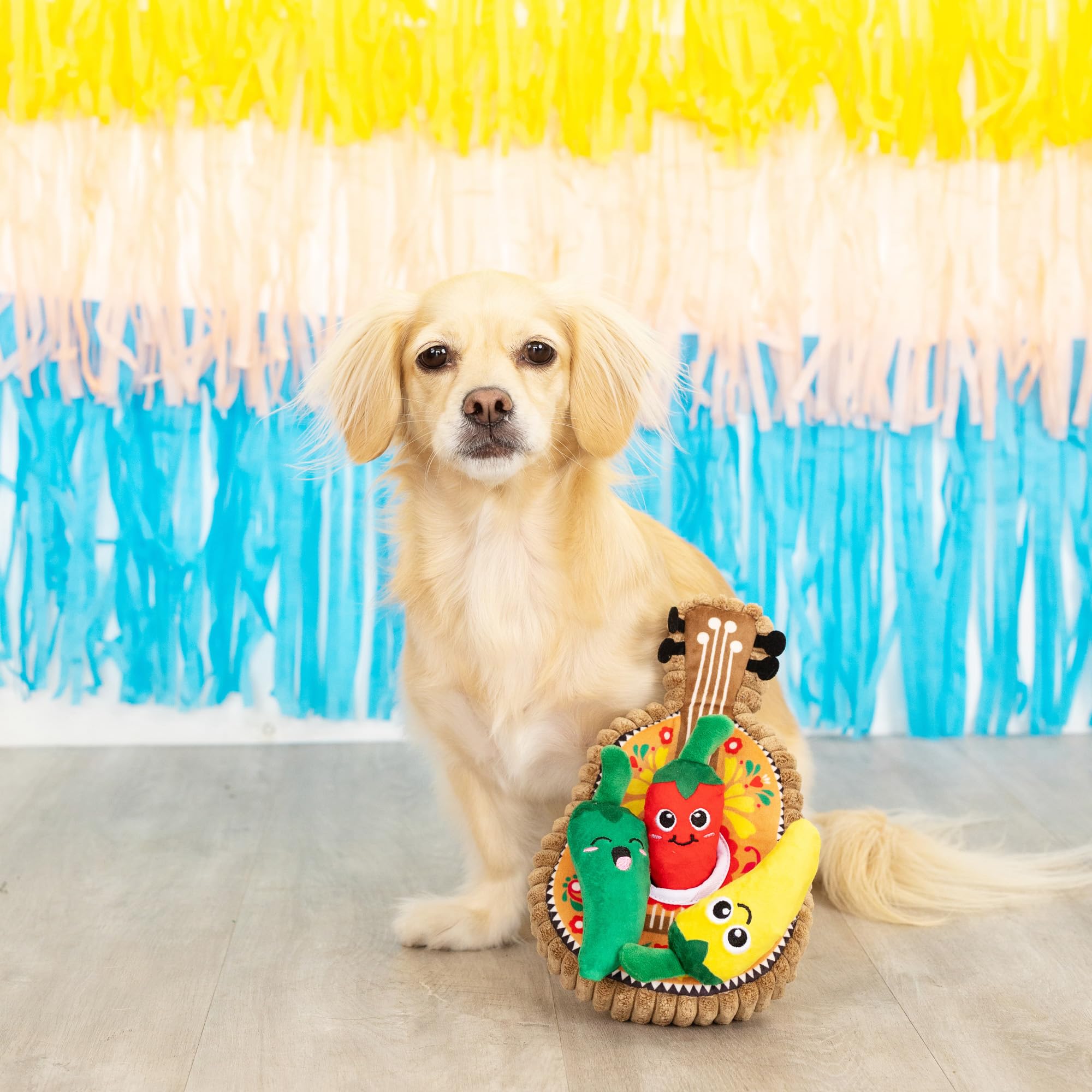 Fringe Studio Fiesta green mini toy with crinkle detail stimulates exploration.