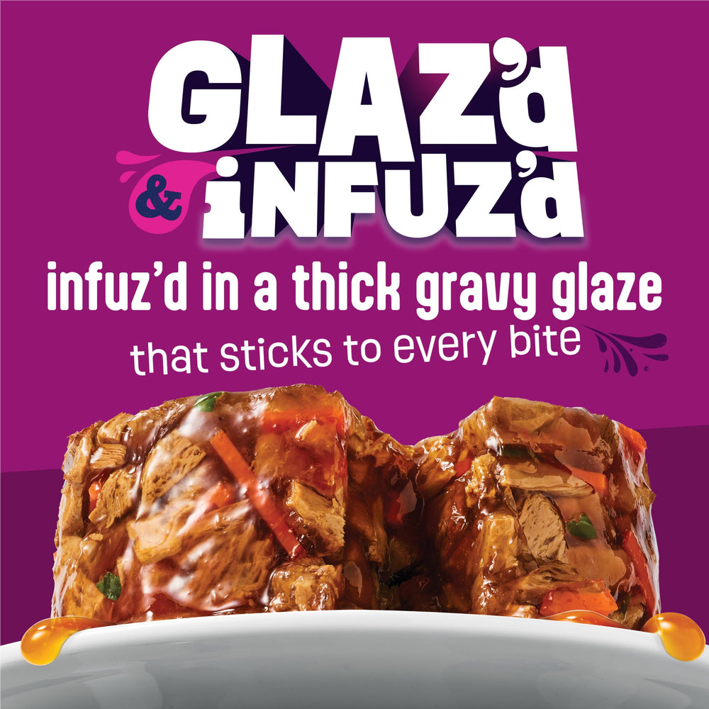 Friskies Glazd Infuzd chicken gravy close-up showing glossy glaze texture.