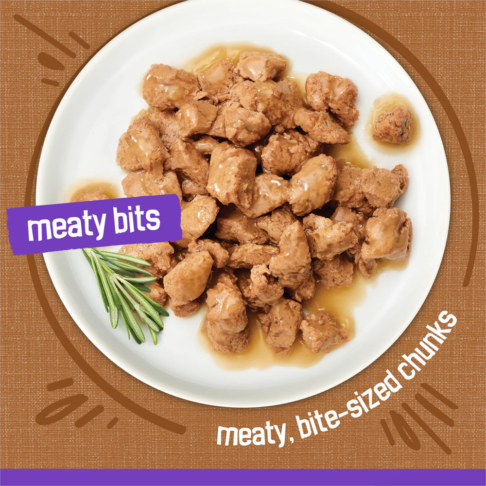 Friskies Meaty Bits Gourmet Grill with gravy highlighting moisture and flavor.
