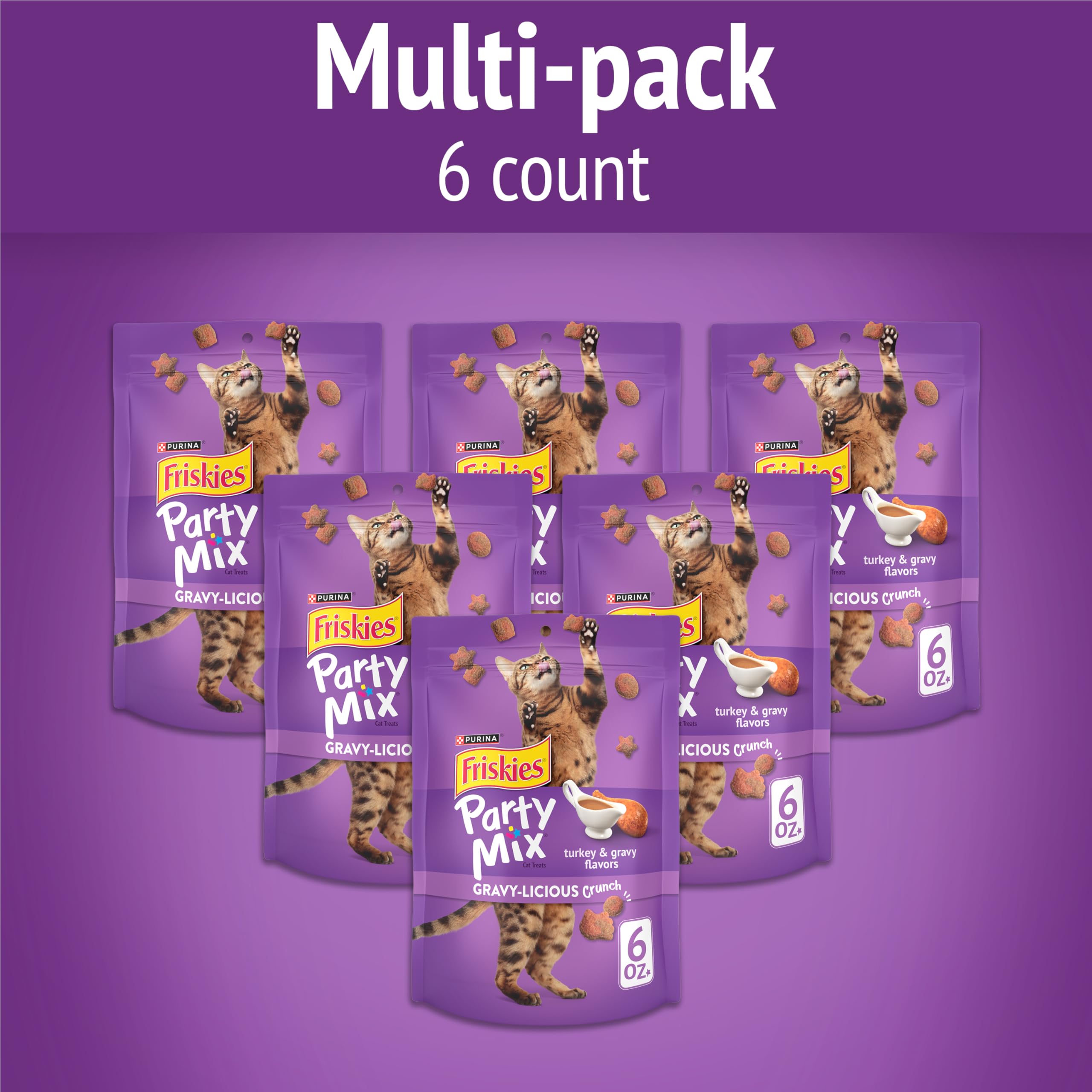 Friskies Party Mix Crunch treats close-up reveals turkey and gravy flavors for tempting rewards.