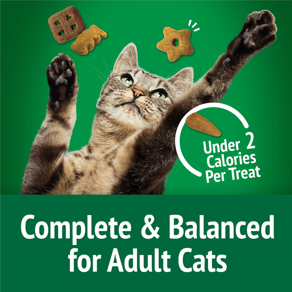 Adult cats enjoying Friskies Party Mix Picnic Crunch as a between-meal snack