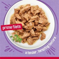 Texture closeup of Friskies Prime Filets Turkey Dinner shredded turkey pieces.
