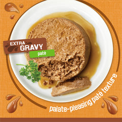 Friskies Gravy Pate smooth texture in bowl entices nibbling.