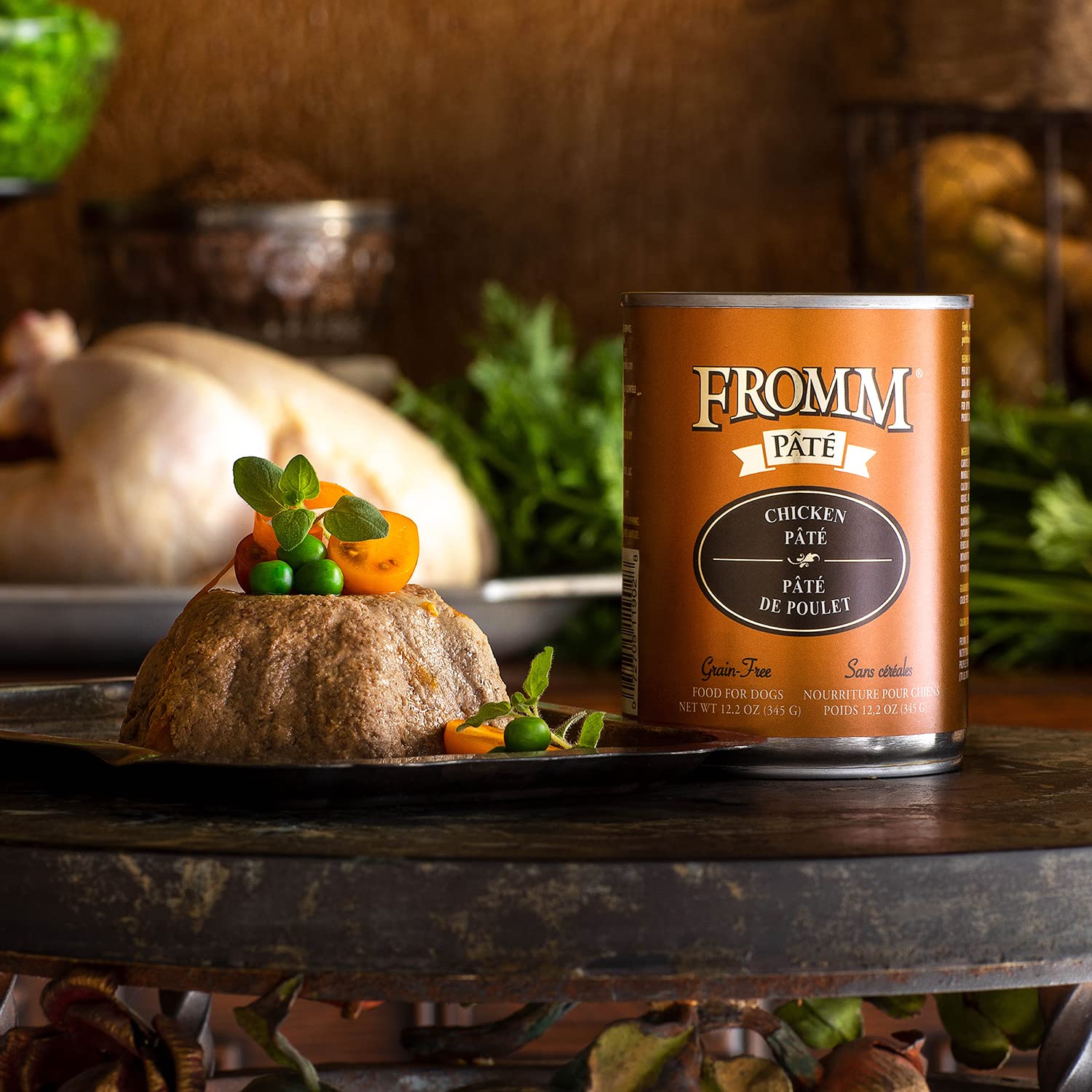 Closeup of Fromm chicken pate cans showing premium packaging