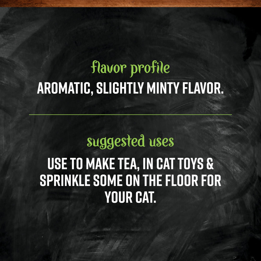 Sprinkling Frontier Co-op catnip on a cat's toys for playtime.