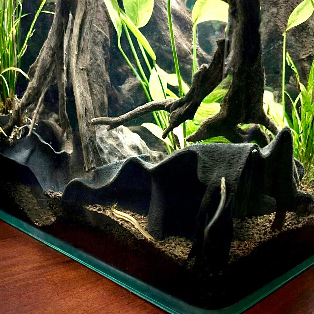 FROSTO aquarium decor charcoal finish enhances natural look.