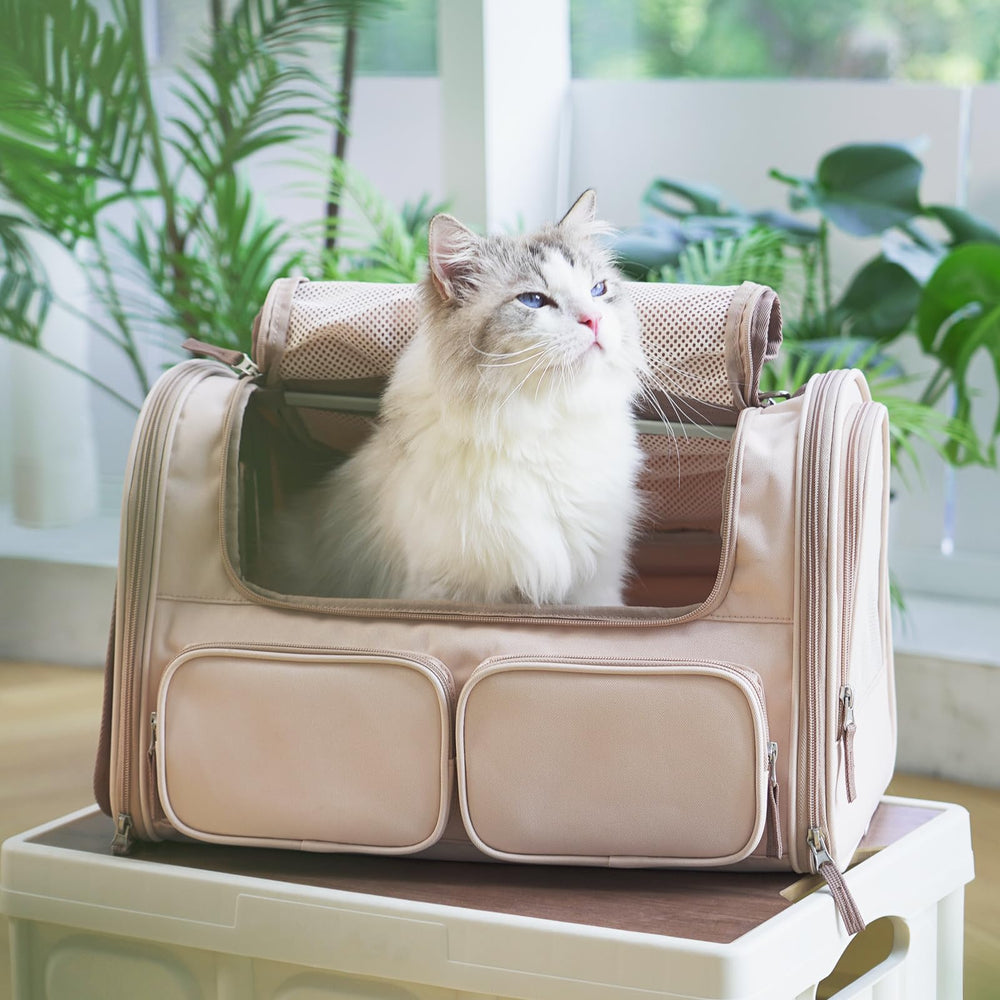 FUKUMARU pink carrier with rollable cover to help calm nervous pets.