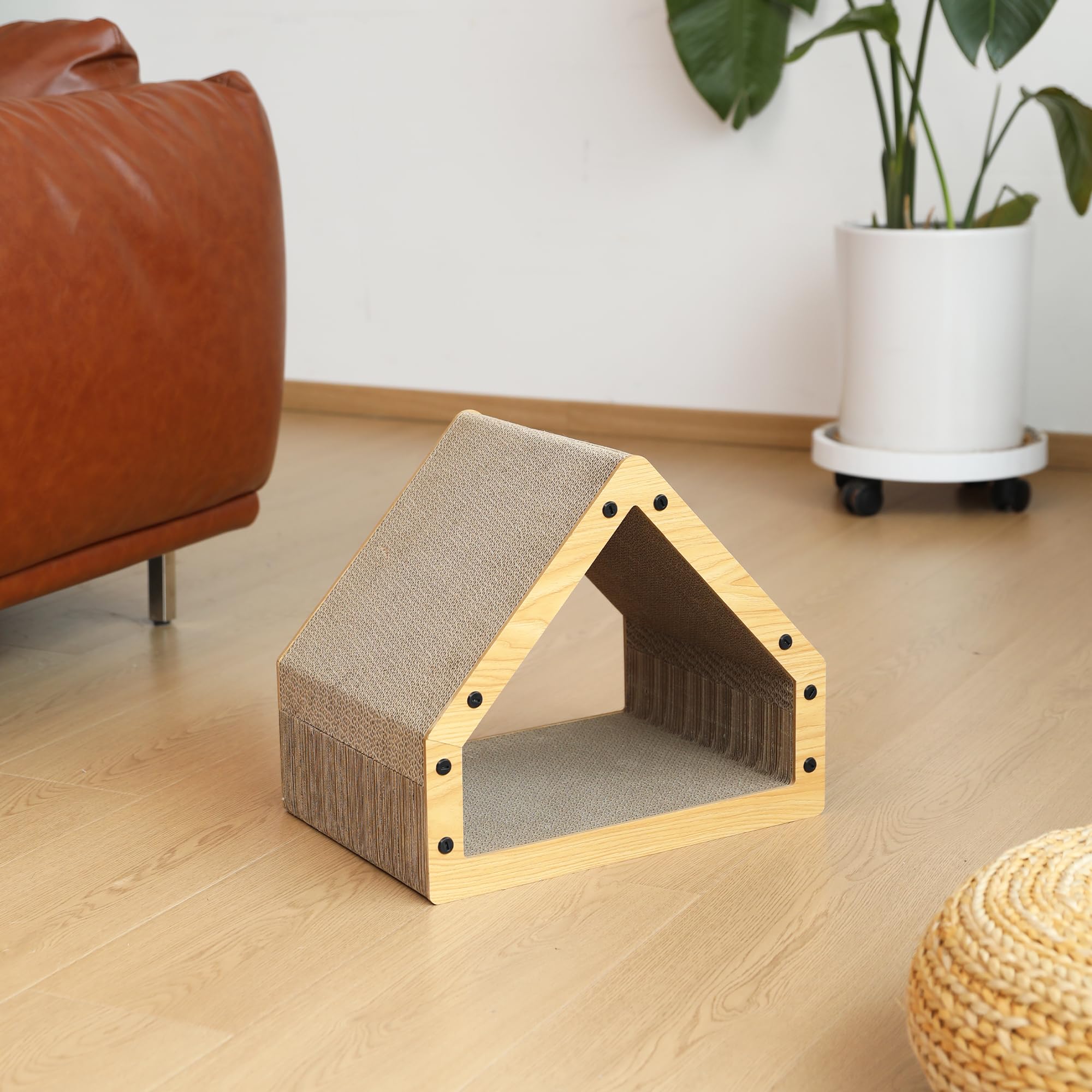 FUKUMARU scratcher doubles as a tunnel for play and a bed at night.