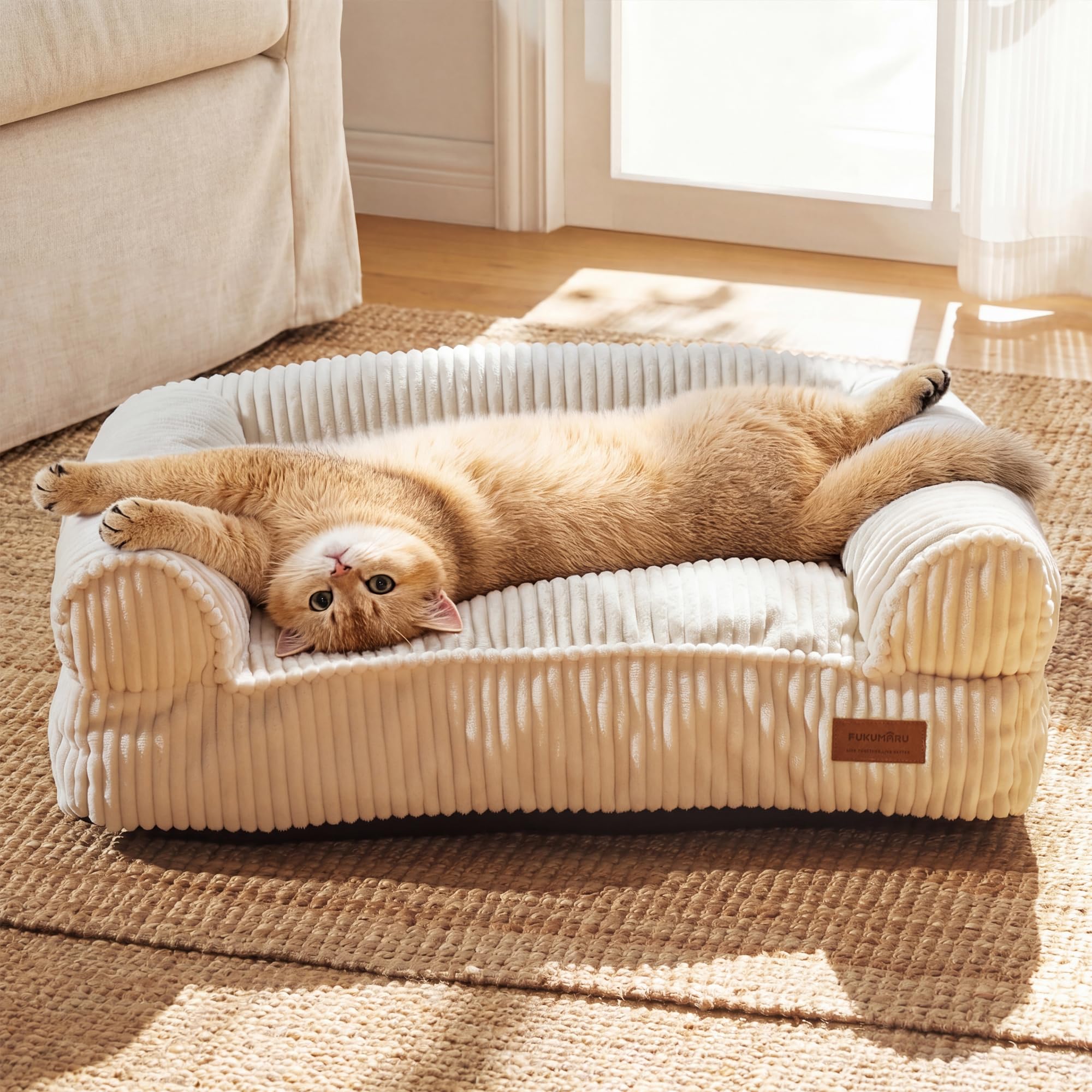 FUKUMARU dog couch bed in corduroy cream offers warm, cozy lounging for pets