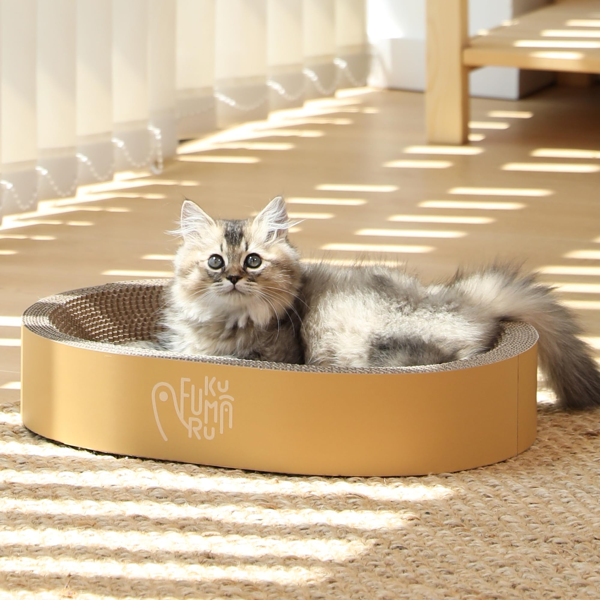 FUKUMARU ergonomic nest promotes calm lounging for cats.