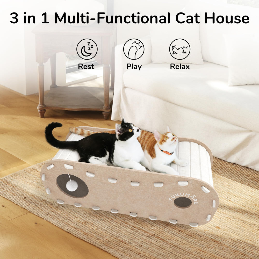 FUKUMARU extra-long bed with fluffy ball invites playful lounging and enrichment