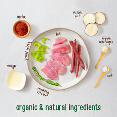 Close-up shows duck, cassava root, and rosemary ingredients for real-meat flavor.