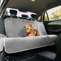Funny Fuzzy back seat cover for dog car seat protects against mud and fur.