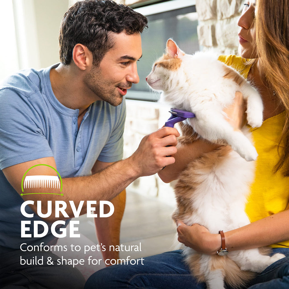 Ergonomic handle on the FURminator deShedding tool.