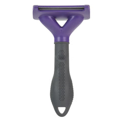 FURminator deShedding tool shows stainless steel edge safely lifting loose hair from undercoat.