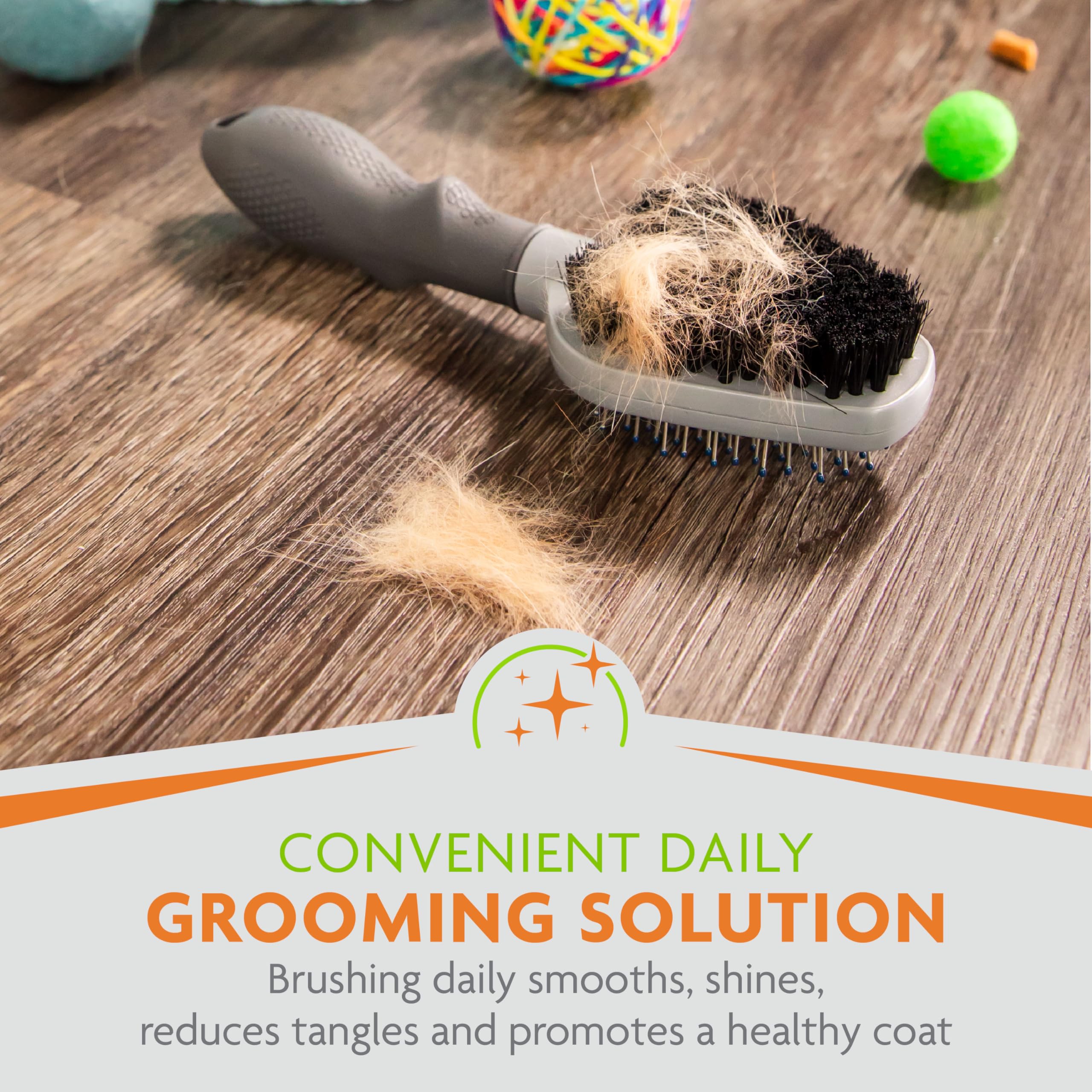 FURminator Dual Grooming Brush ergonomic handle for comfortable control.