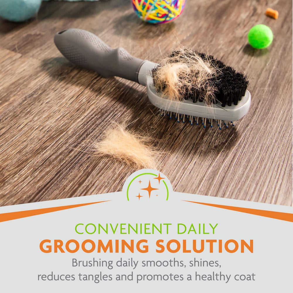 FURminator Dual Grooming Brush ergonomic handle for comfortable control.