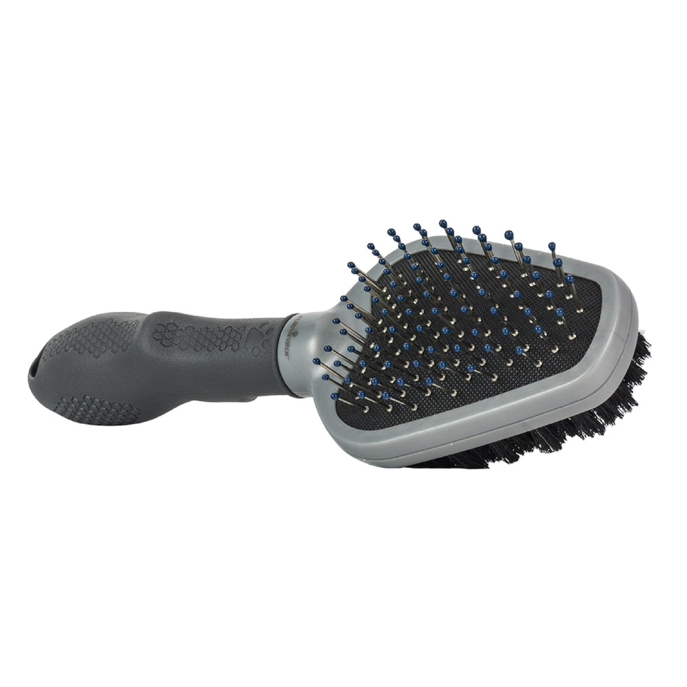 FURminator Dual Grooming Brush with metal bristles detangles and removes loose fur.
