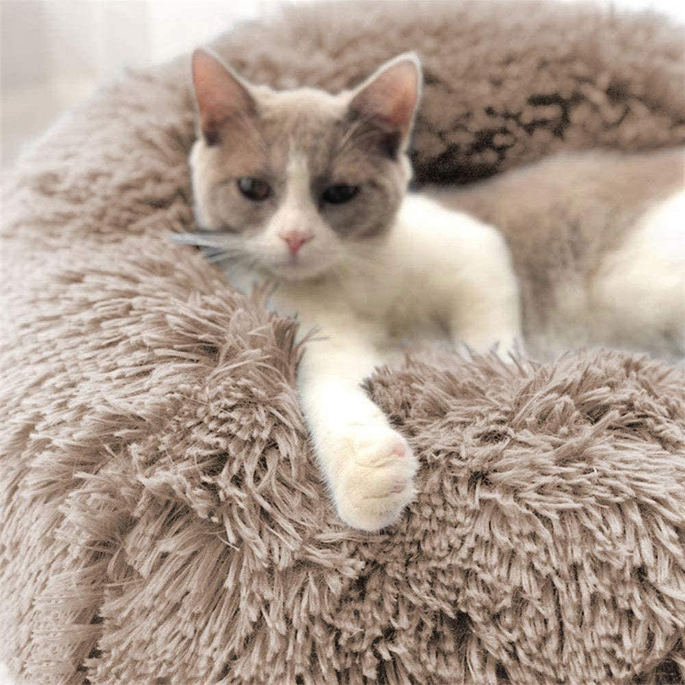 Generic cat bed donut washable fabric is easy to clean after messy meals.