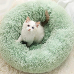 Generic round cat bed in light green, 20in, ideal for curling up.