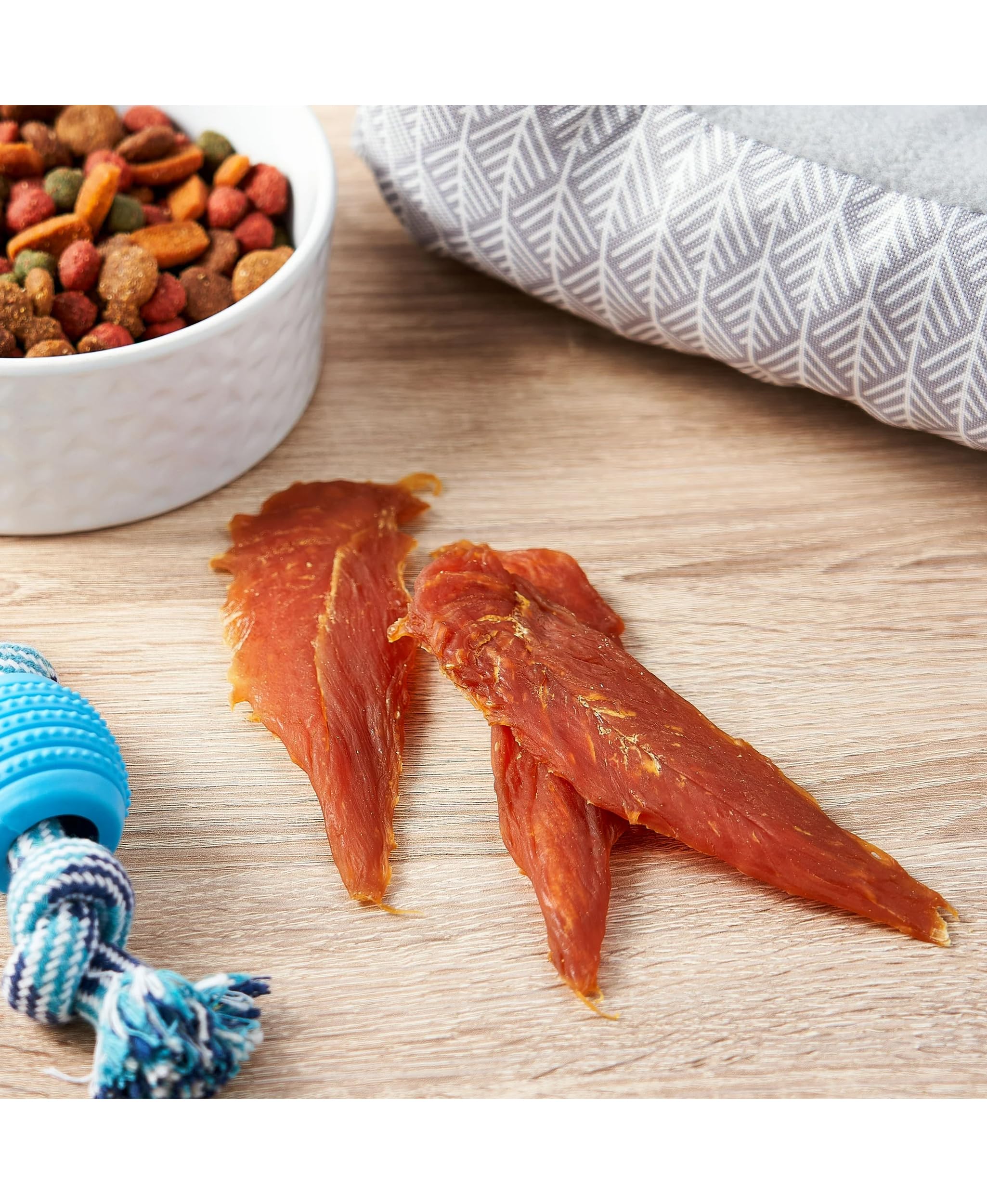 Generic Golden Rewards chicken jerky texture close-up highlights tender chew.